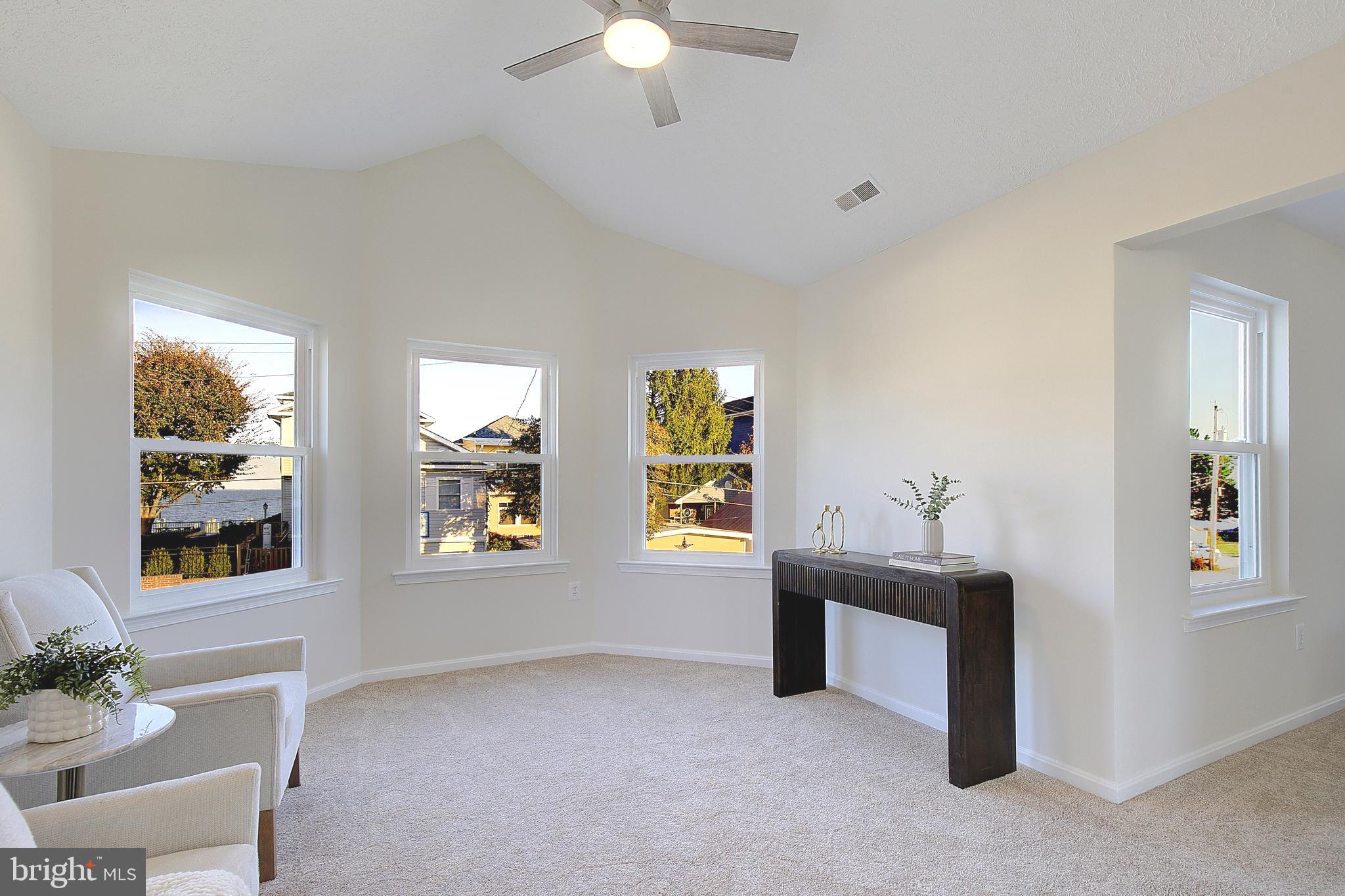 8714 C Street Chesapeake Beach, MD 20732 - Photo 34 of 66 a view of an empty room with a window