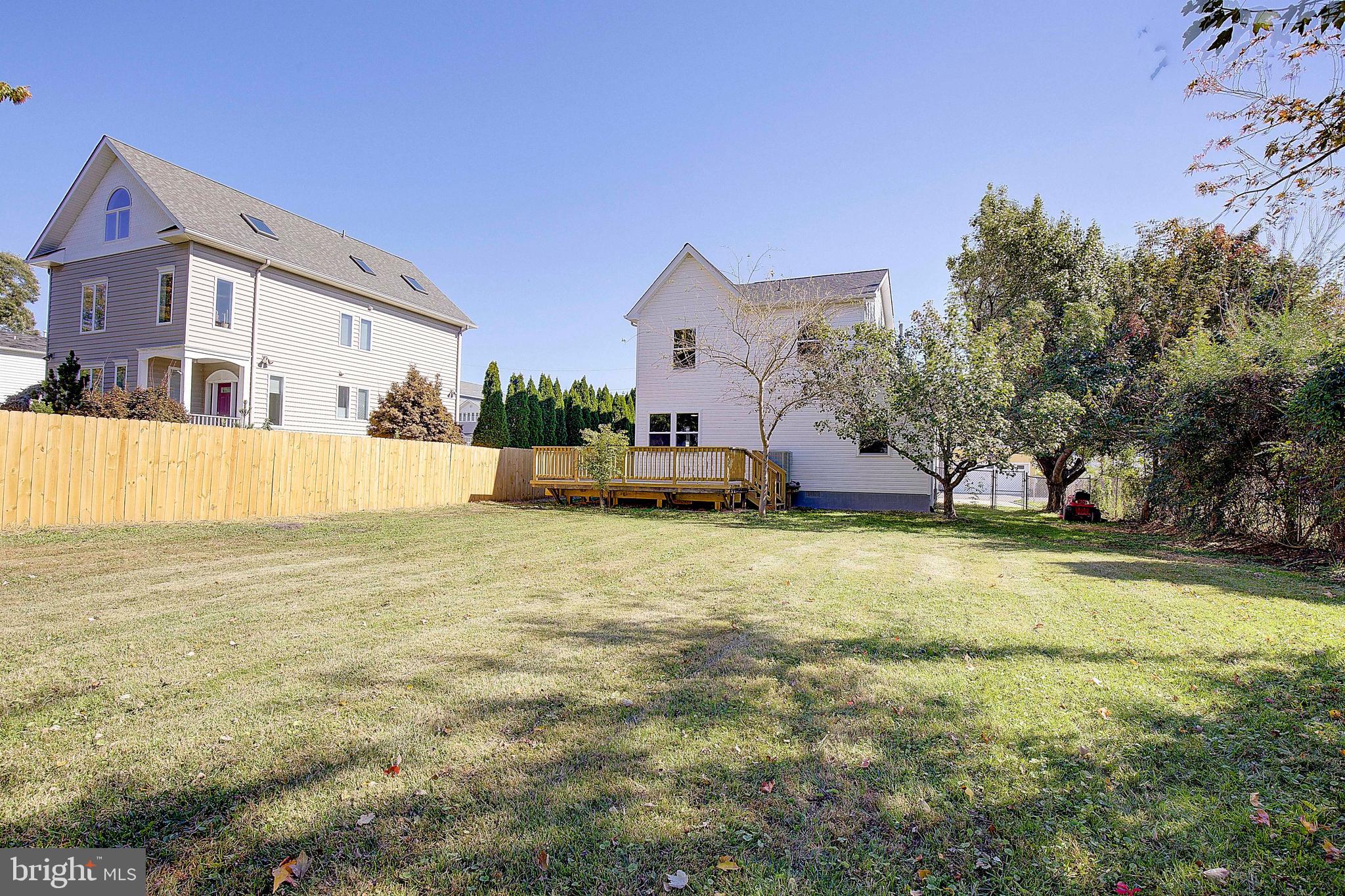 8714 C Street Chesapeake Beach, MD 20732 - Photo 48 of 66 a front view of house with yard and trees
