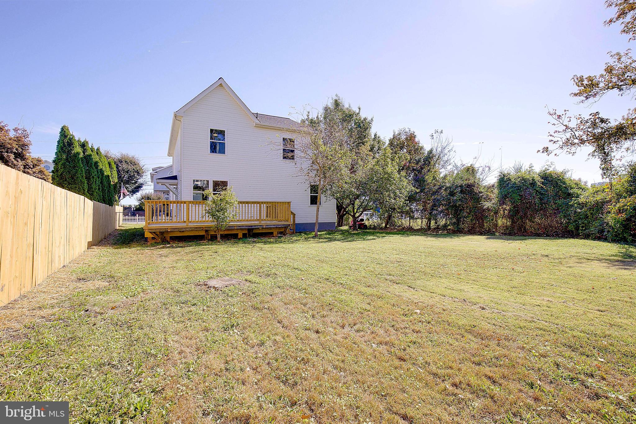 8714 C Street Chesapeake Beach, MD 20732 - Photo 50 of 66 a view of a house with backyard and trees