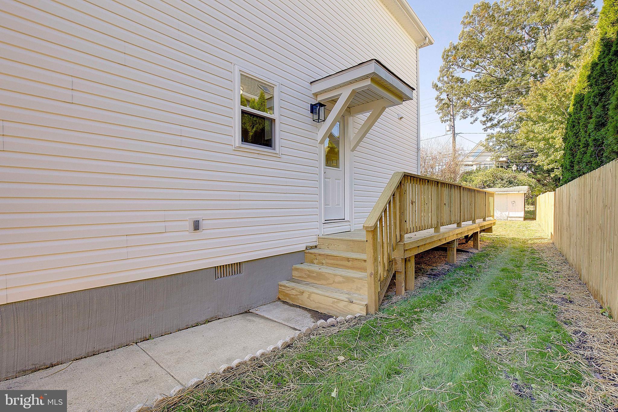 8714 C Street Chesapeake Beach, MD 20732 - Photo 51 of 66 a view of a house with a yard and stairs