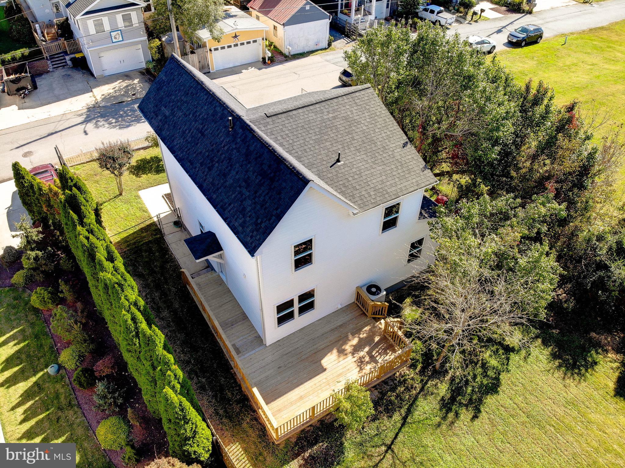 8714 C Street Chesapeake Beach, MD 20732 - Photo 65 of 66 a view of a backyard with plants