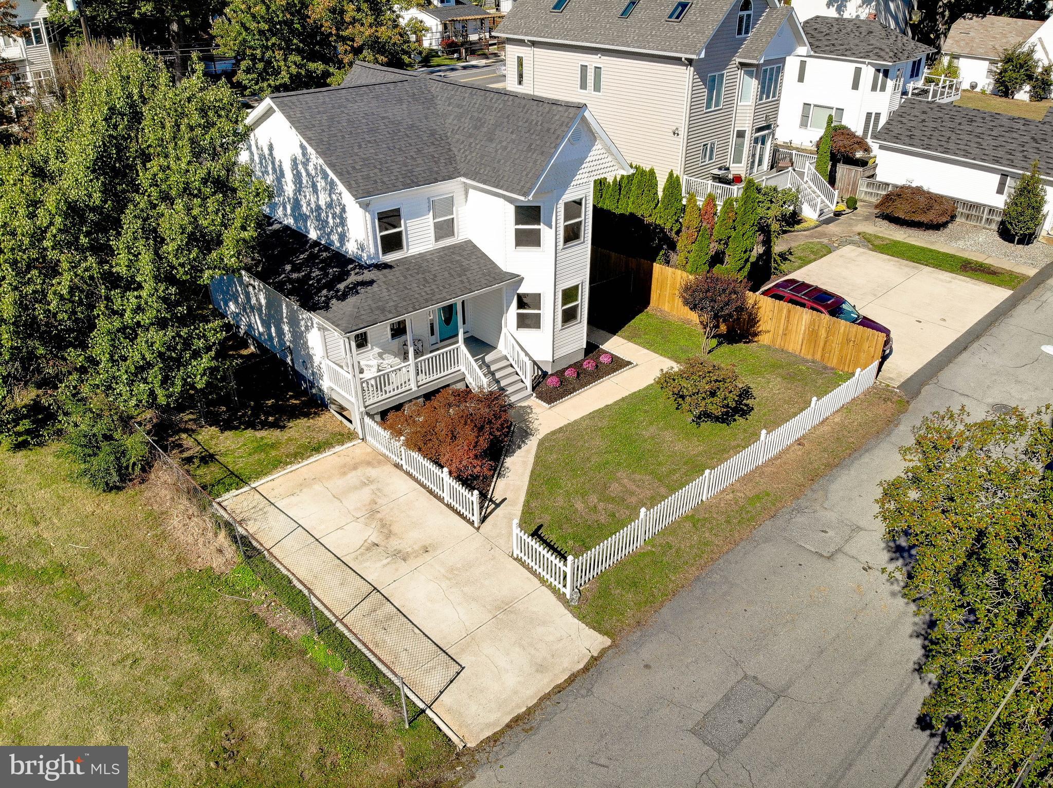 8714 C Street Chesapeake Beach, MD 20732 - Photo 66 of 66 an aerial view of a house with a swimming pool