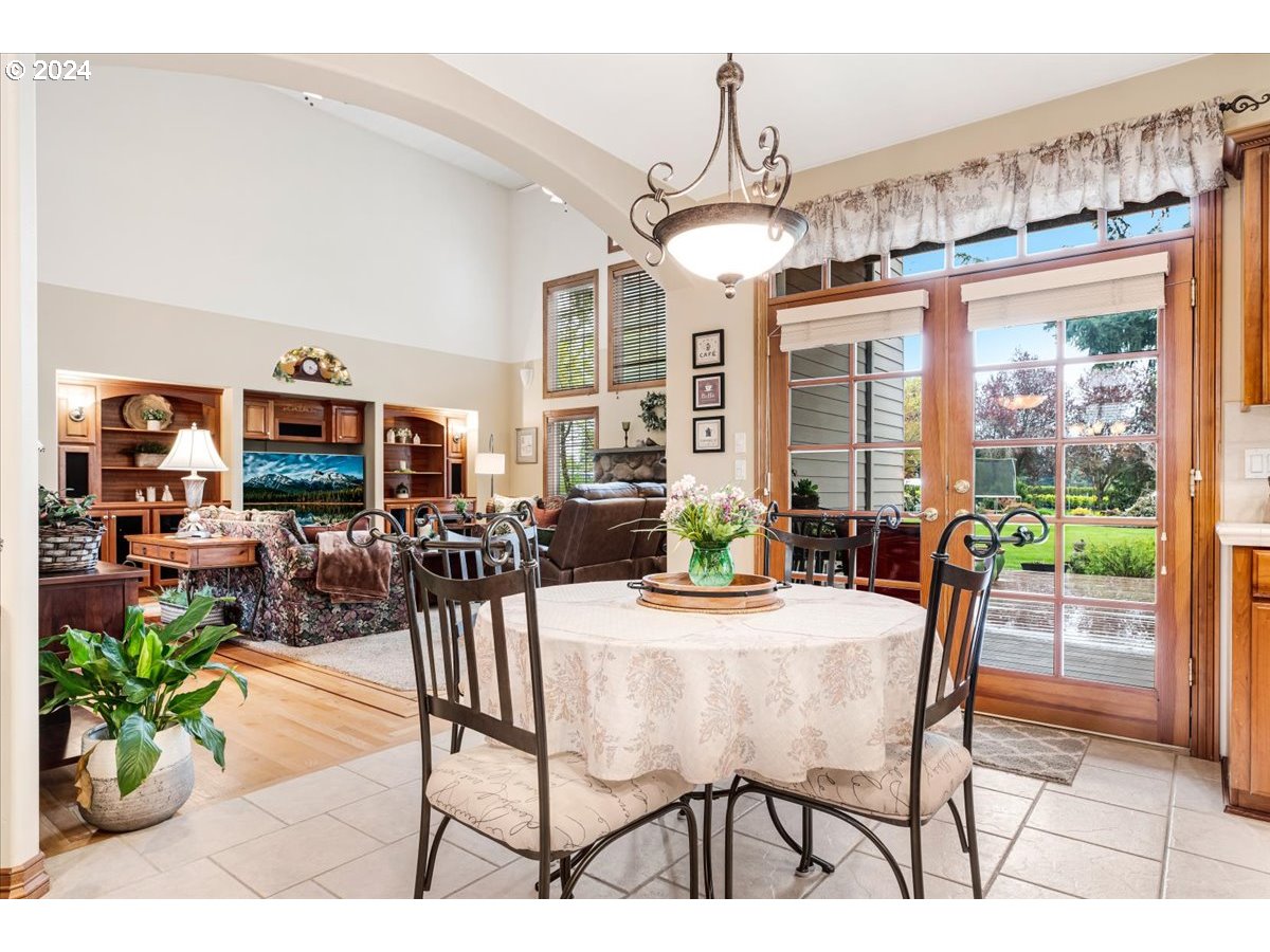 31938 Southeast Dodge Park Boulevard Gresham, OR 97080 - Photo 15 of 48 a view of a dining room with furniture window and outside view