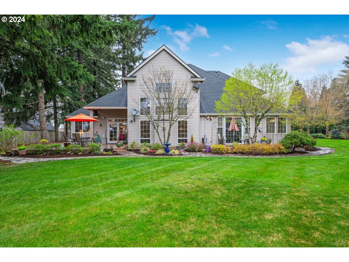 31938 Southeast Dodge Park Boulevard Gresham, OR 97080 - Photo 43 of 48 a view of a house with a big yard
