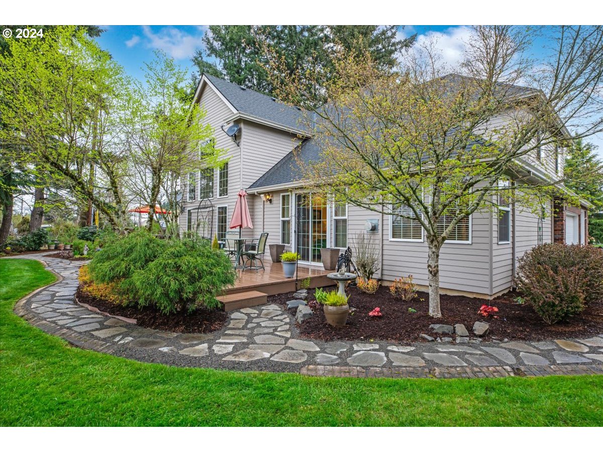 31938 Southeast Dodge Park Boulevard Gresham, OR 97080 - Photo 47 of 48 a front view of a house with yard and green space