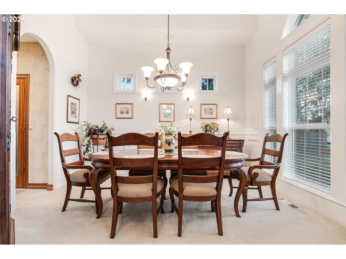31938 Southeast Dodge Park Boulevard Gresham, OR 97080 - Photo 9 of 48 a dining room with furniture and window