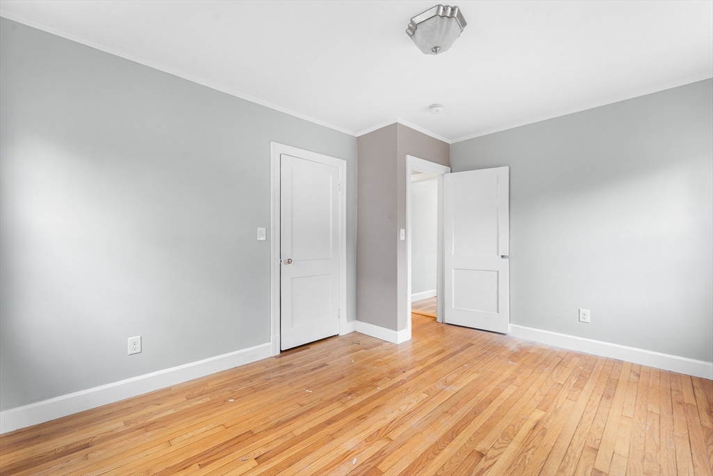 127 Old Millville Road Uxbridge, MA 01569 - Photo 12 of 30 a view of an empty room and wooden floor