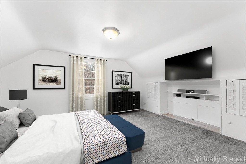 127 Old Millville Road Uxbridge, MA 01569 - Photo 20 of 30 a bedroom with a bed and a flat screen tv