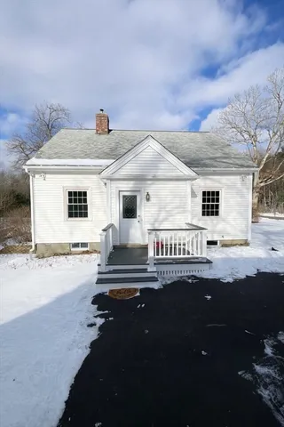 a front view of a house with entertaining space