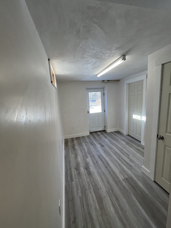 127 Old Millville Road Uxbridge, MA 01569 - Photo 26 of 30 a view of empty room with wooden floor