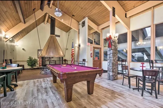 a view of a living room and dining room