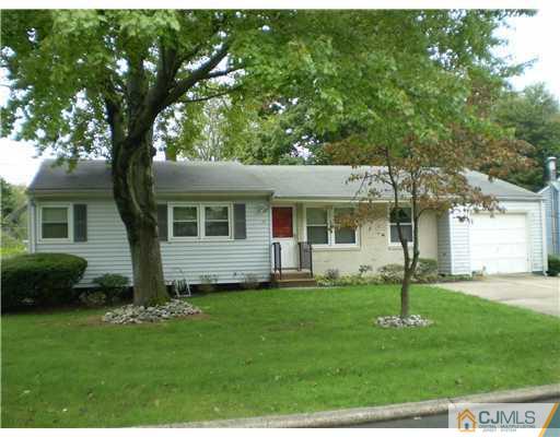 37 Glen Gary Road Middlesex, NJ 08846 - Photo 1 of 15 a view of a house with a yard and a large tree