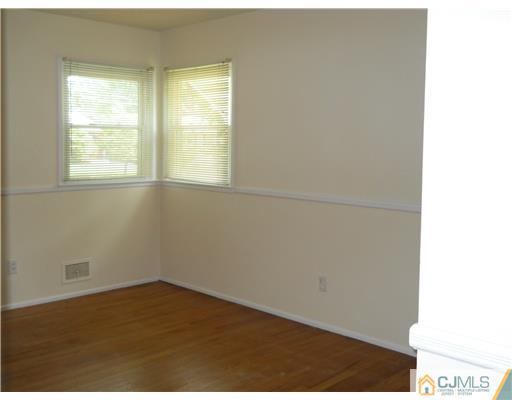 37 Glen Gary Road Middlesex, NJ 08846 - Photo 14 of 15 a view of empty room with wooden floor