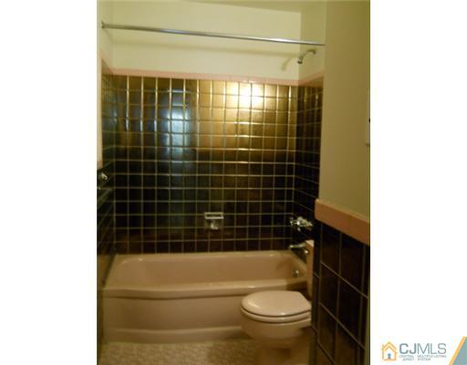 37 Glen Gary Road Middlesex, NJ 08846 - Photo 15 of 15 a bathroom with a bathtub and a shower