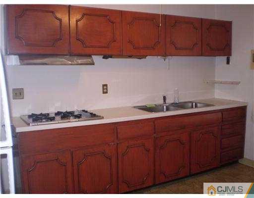 37 Glen Gary Road Middlesex, NJ 08846 - Photo 6 of 15 a kitchen with stainless steel appliances granite countertop a sink dishwasher stove and cabinets