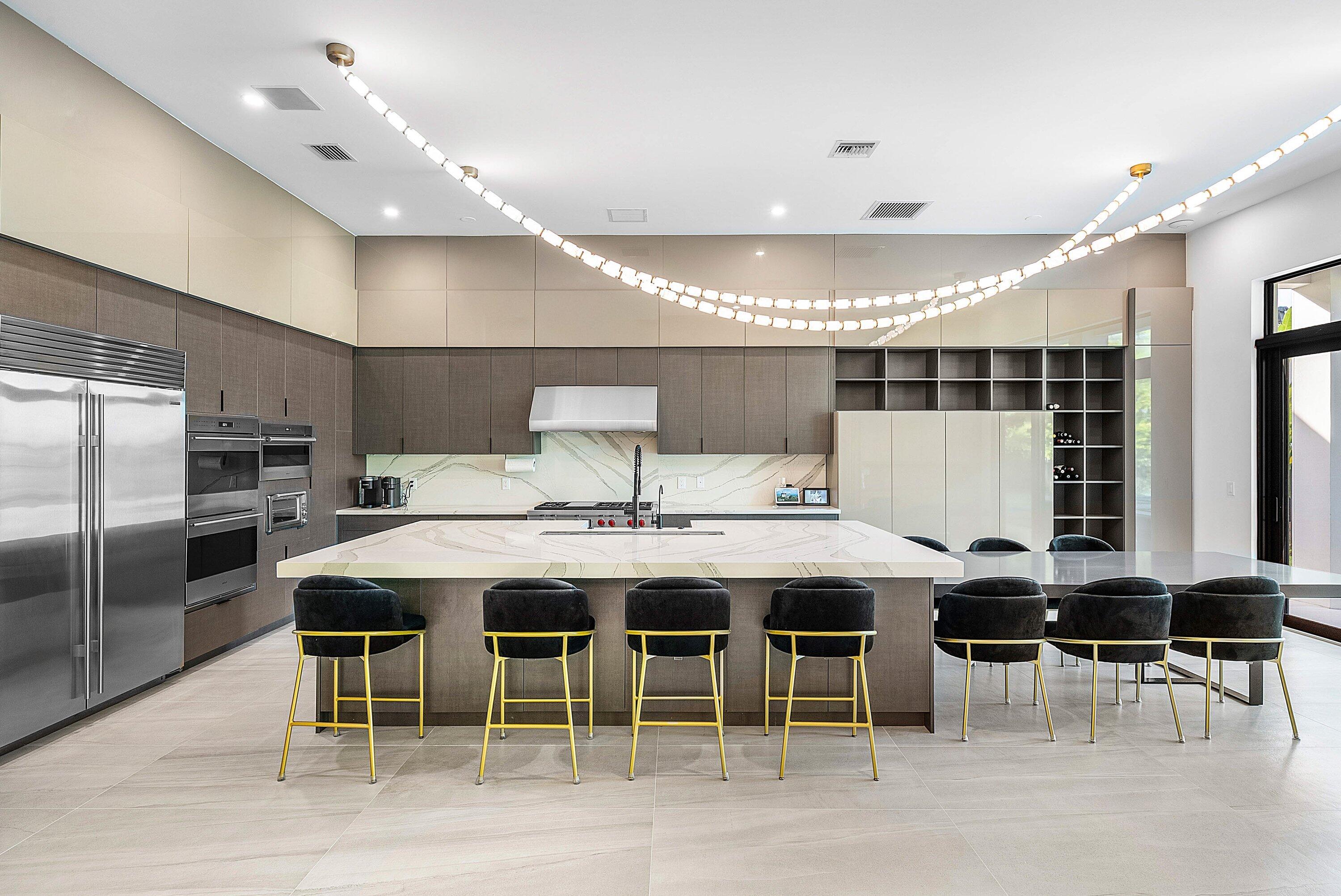 17353 Rosella Road Boca Raton, FL 33496 - Photo 16 of 77 a kitchen with a table and chairs in it