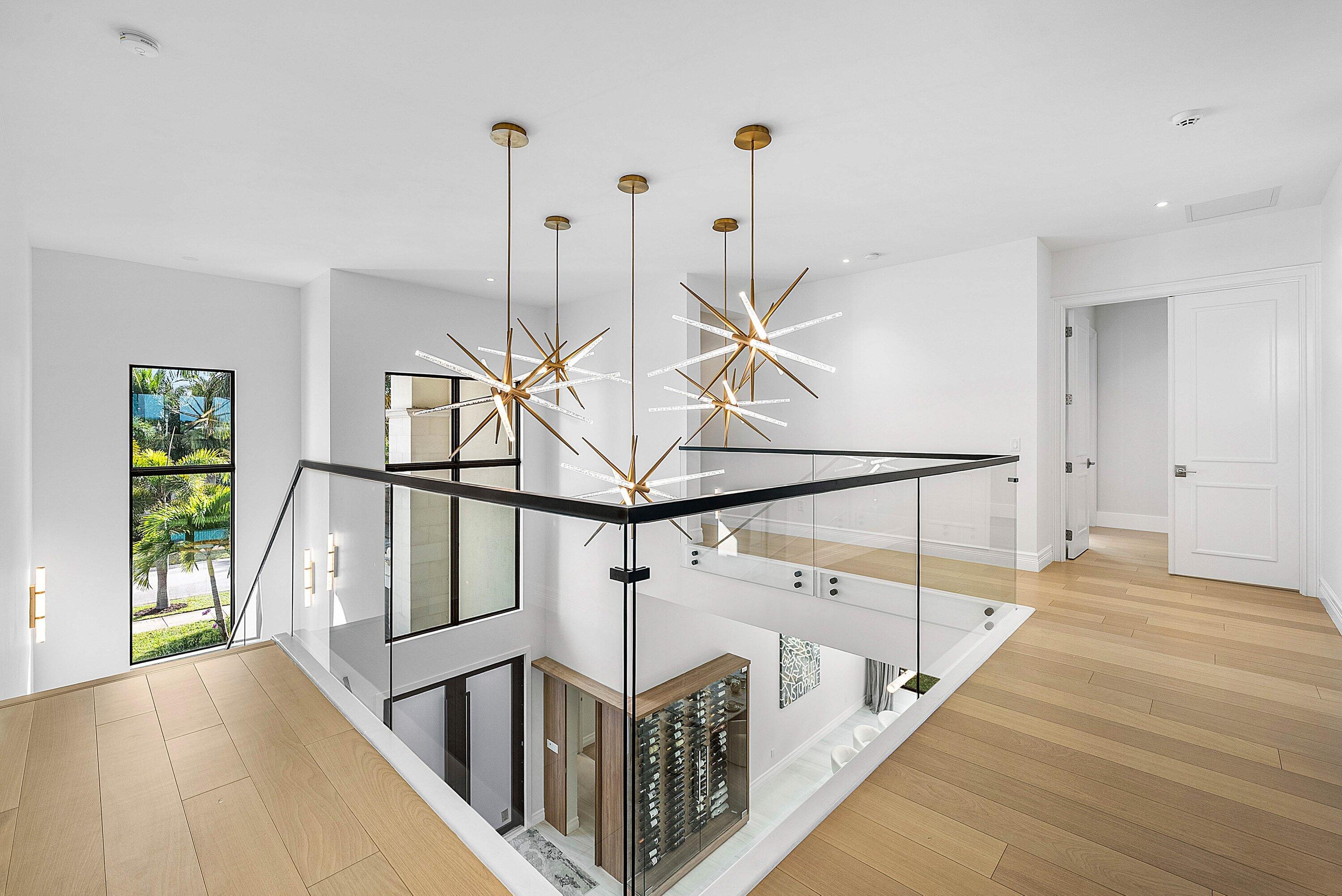 17353 Rosella Road Boca Raton, FL 33496 - Photo 22 of 77 a view of entryway and hall with wooden floor