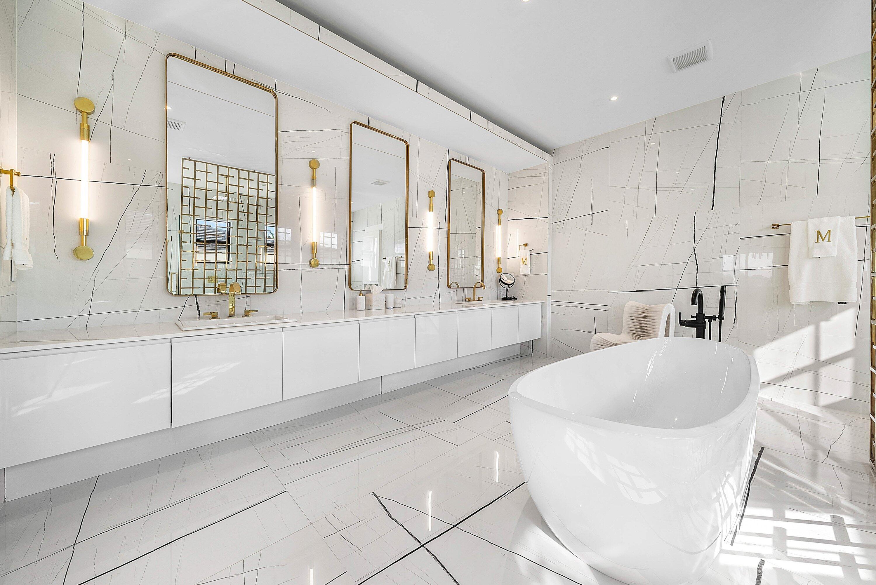 17353 Rosella Road Boca Raton, FL 33496 - Photo 41 of 77 a large white tub sitting in a bathroom