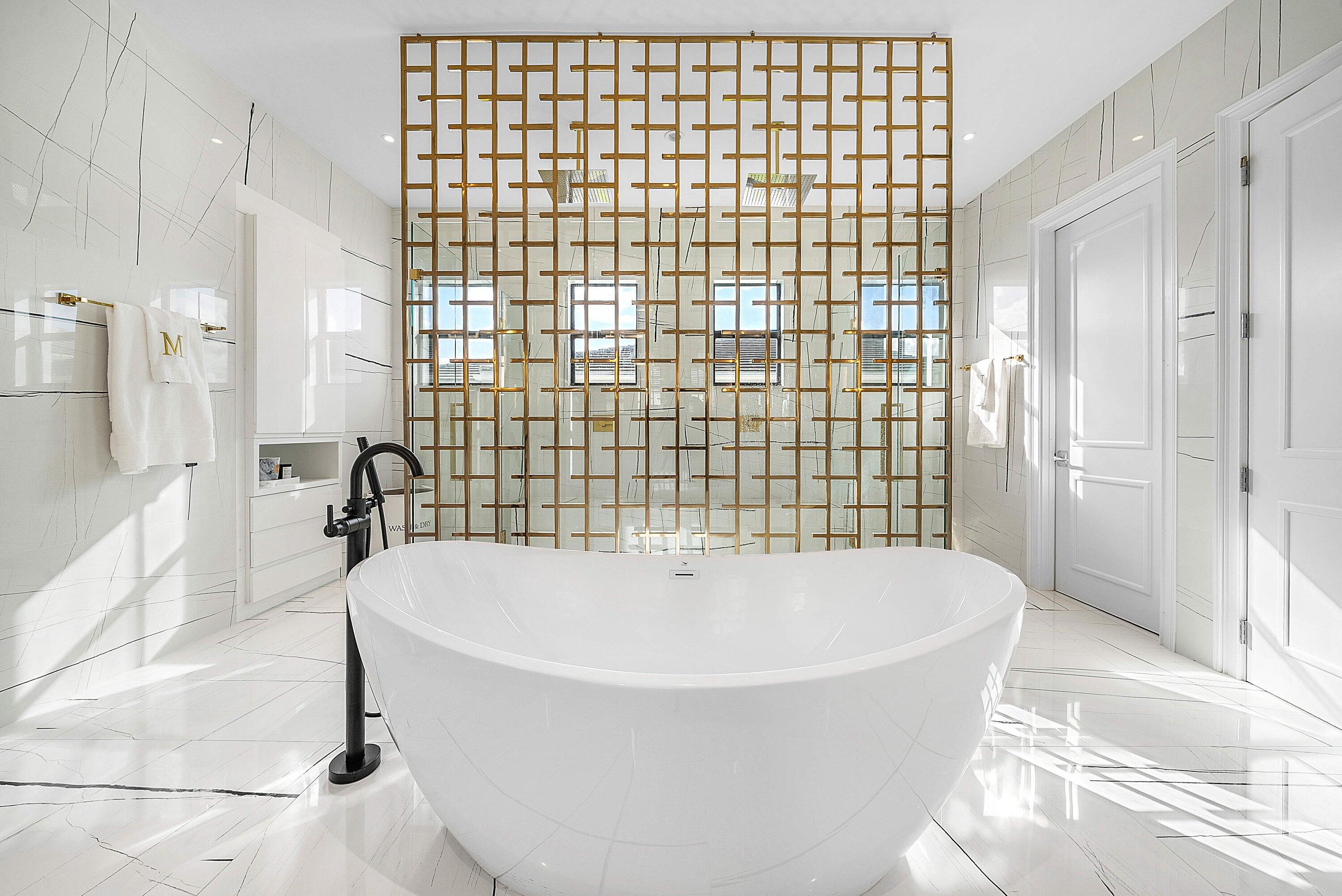 17353 Rosella Road Boca Raton, FL 33496 - Photo 42 of 77 a bathroom with a bathtub and shower