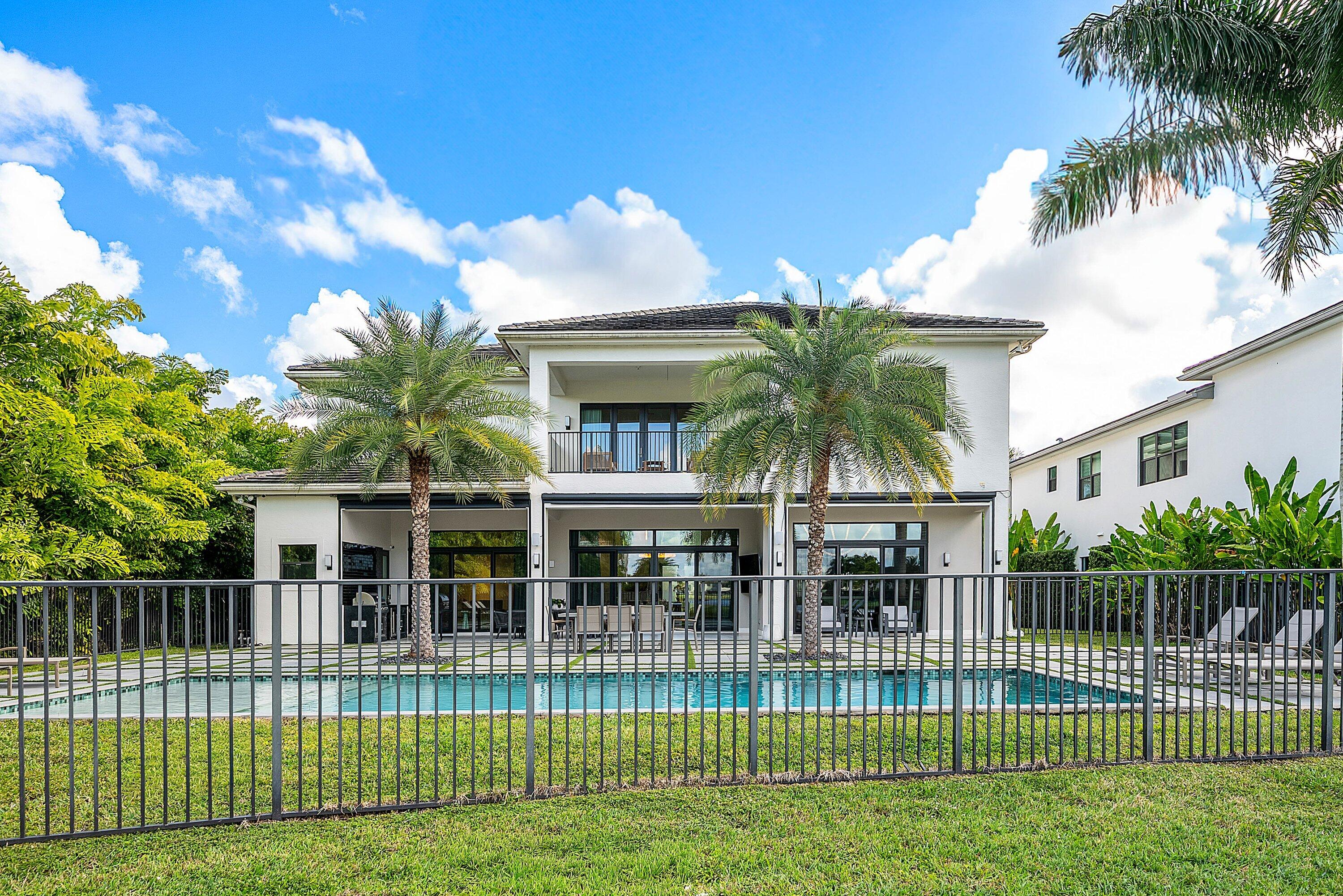 17353 Rosella Road Boca Raton, FL 33496 - Photo 56 of 77 a view of a house with a yard
