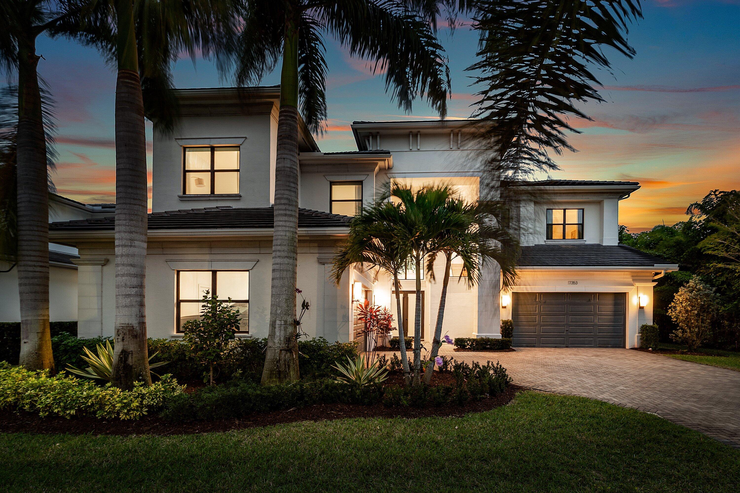 17353 Rosella Road Boca Raton, FL 33496 - Photo 57 of 77 a front view of a house with a garden