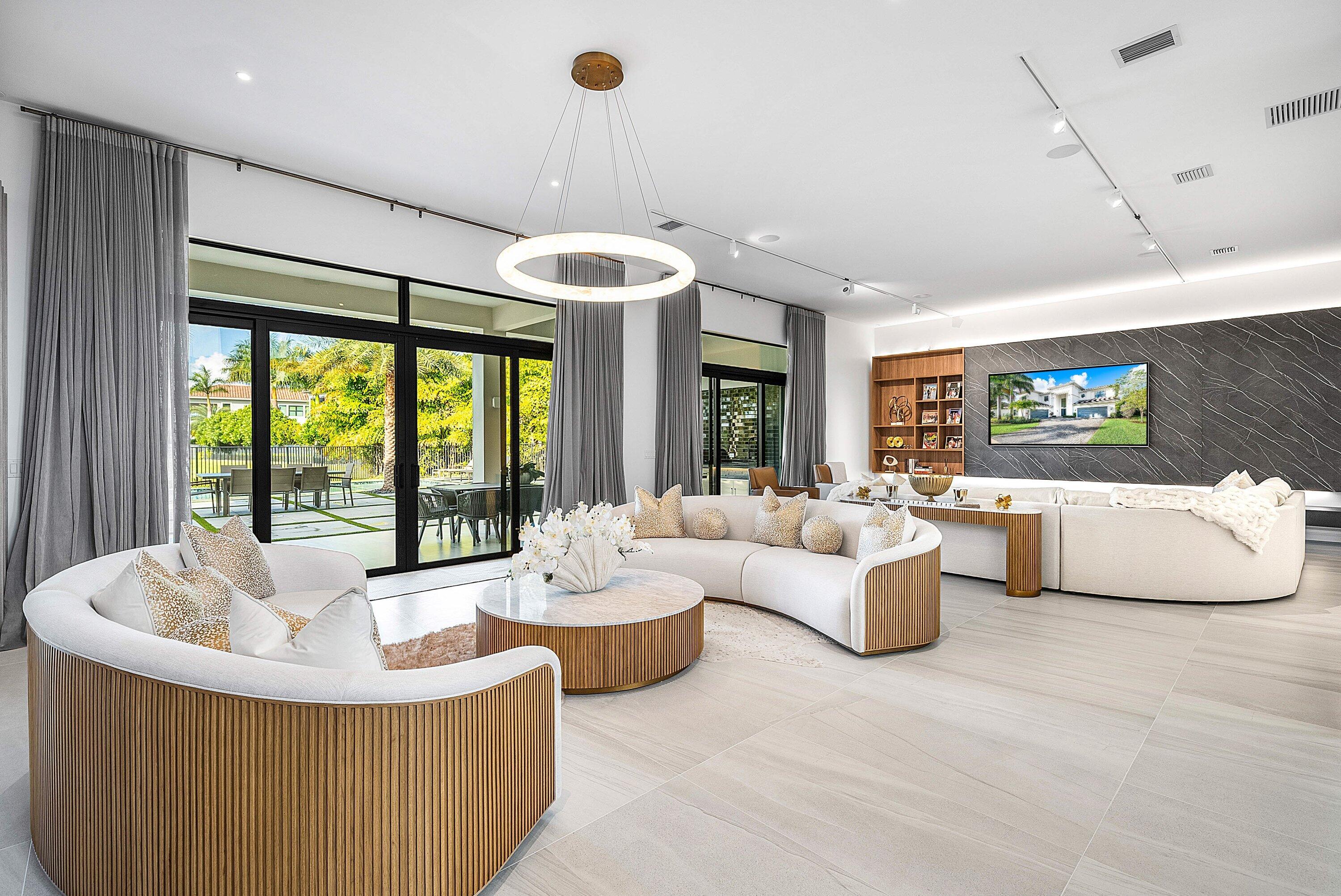 17353 Rosella Road Boca Raton, FL 33496 - Photo 10 of 77 a living room with furniture and a large window