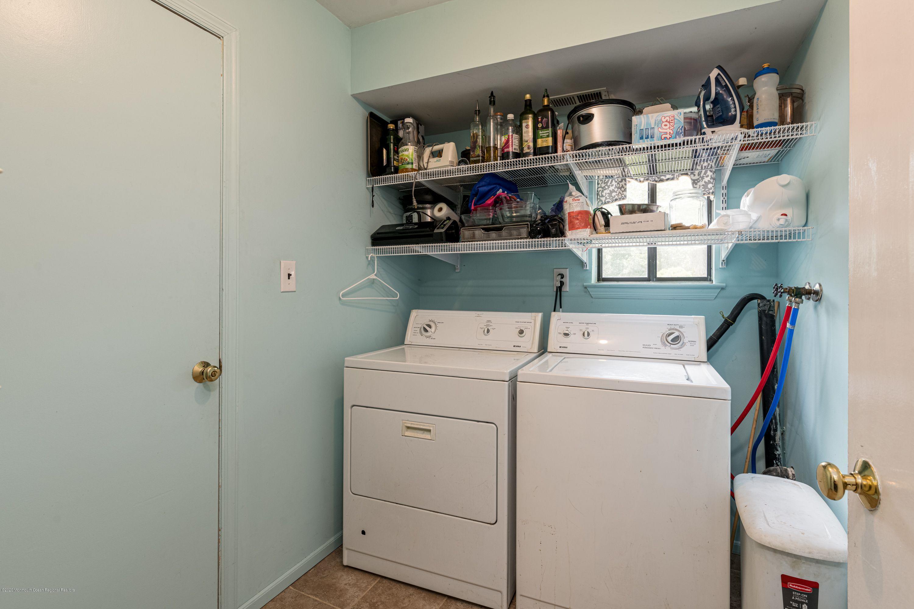 15 Finch Road Howell, NJ 07731 - Photo 11 of 15 a utility room with dryer and washer