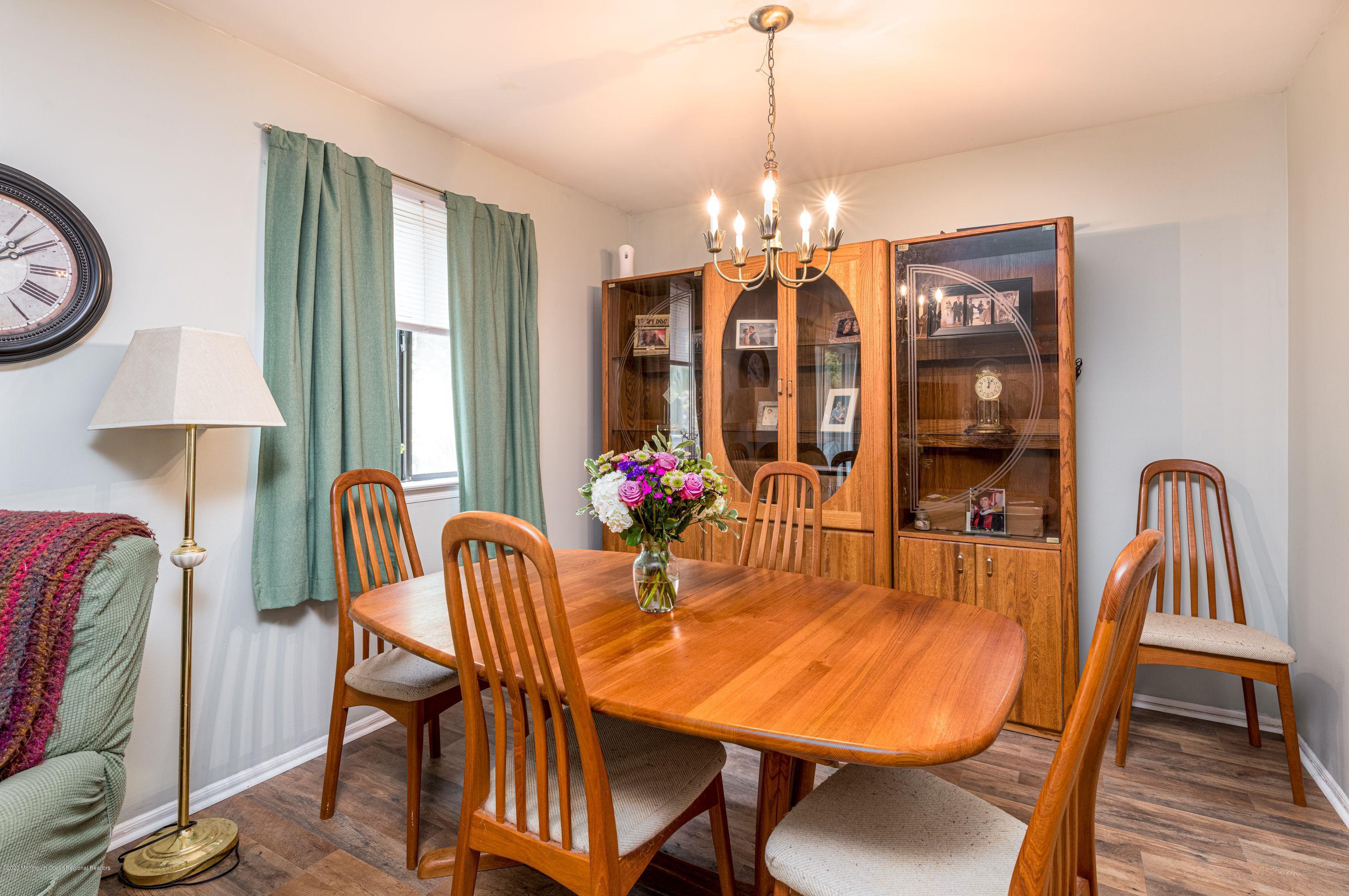 15 Finch Road Howell, NJ 07731 - Photo 7 of 15 a view of a dining room with furniture window and outside view
