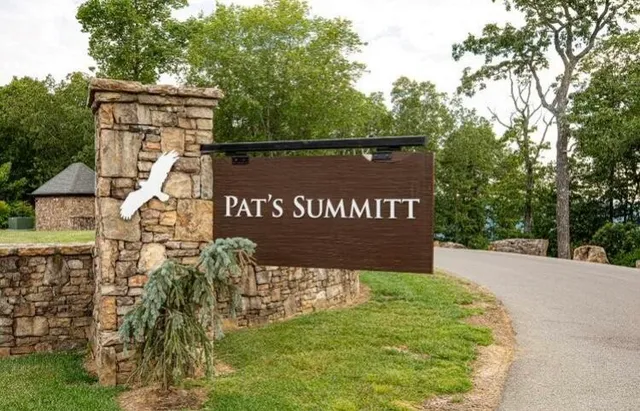 a view of a park with sign board