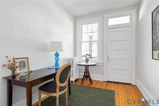 a front view of a residential apartment building with a yard