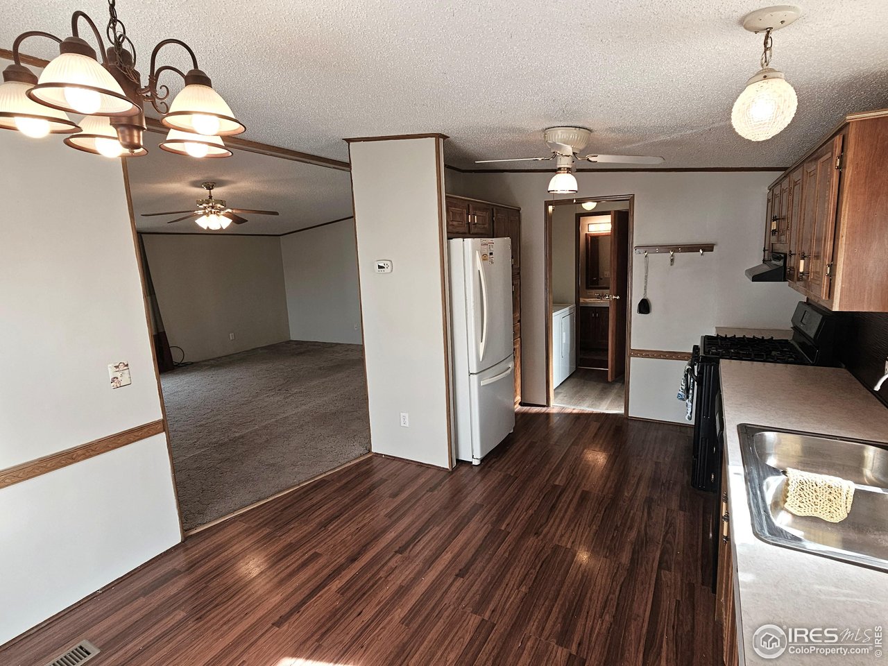 1912 Fillmore Street Sterling, CO 80751 - Photo 12 of 27 Eat-in kitchen is 15 x 10 and has also received a fresh coat of paint