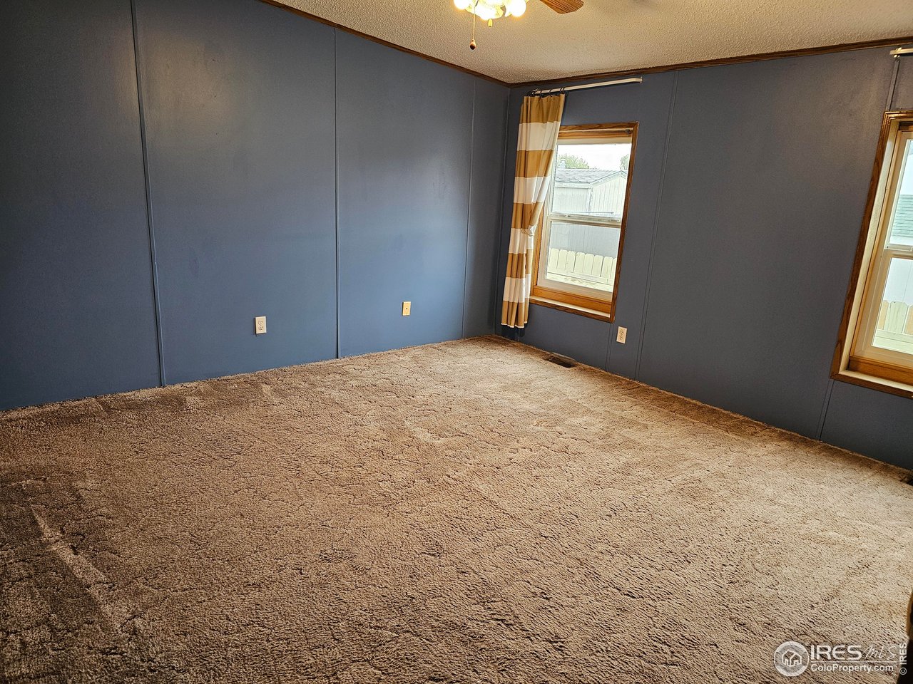 1912 Fillmore Street Sterling, CO 80751 - Photo 15 of 27 Primary bedroom
