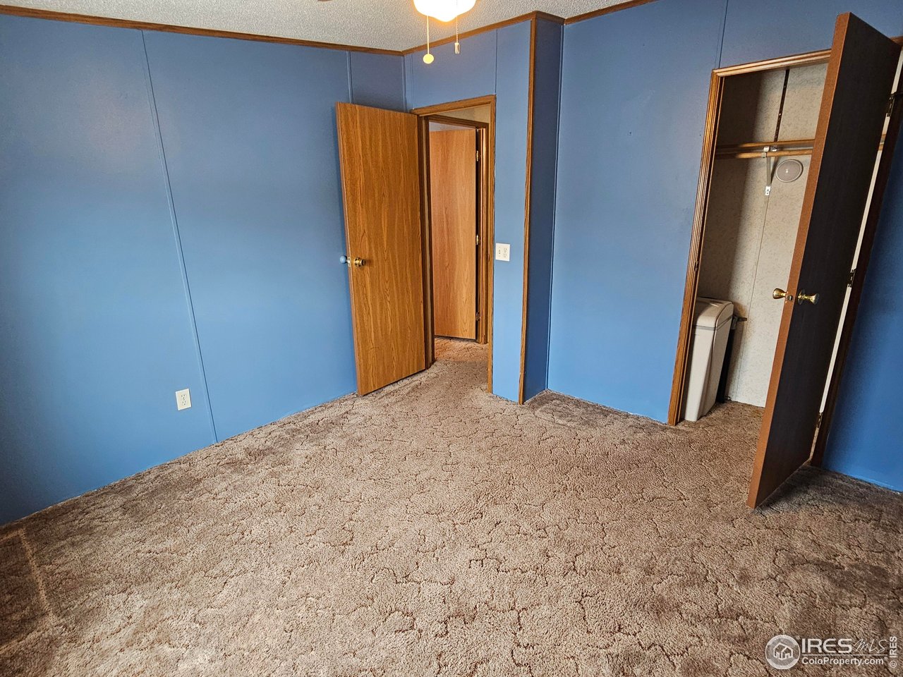 1912 Fillmore Street Sterling, CO 80751 - Photo 20 of 27 2nd bedroom w/ water softener (working condition unknown) in the closet