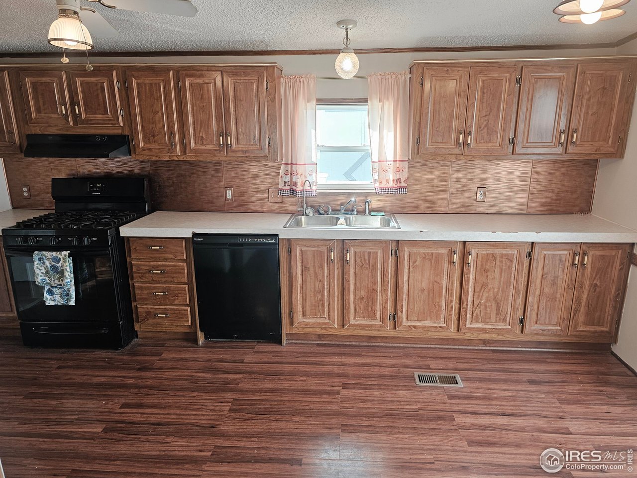 1912 Fillmore Street Sterling, CO 80751 - Photo 10 of 27 Nice counter and cupboard space