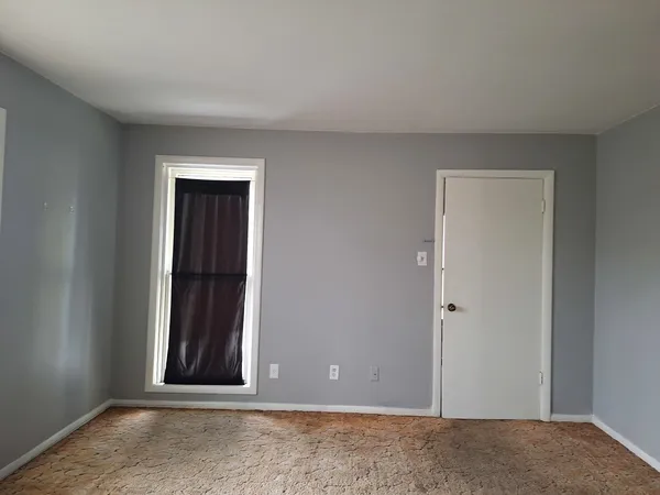 a view of an empty room with window