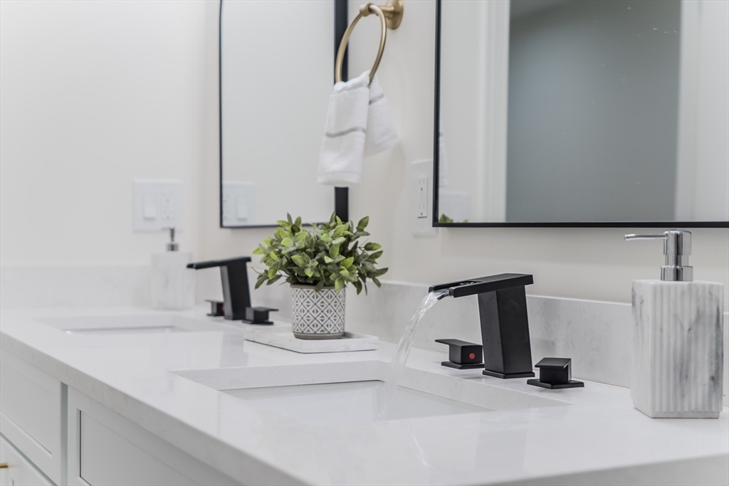 135 Thompson Street Palmer, MA 01069 - Photo 24 of 39 a bathroom with a sink and a mirror