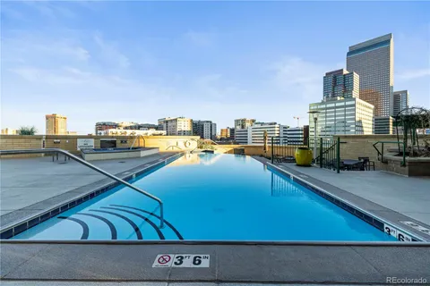 a view of a balcony with city view