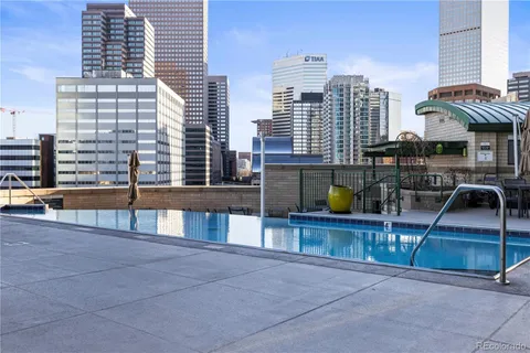 a view of pool with outdoor seating