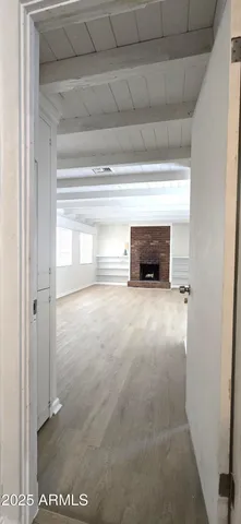 a view of an empty room and window