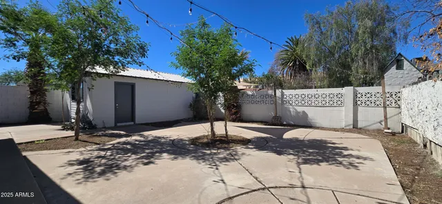 a house with trees in front of it