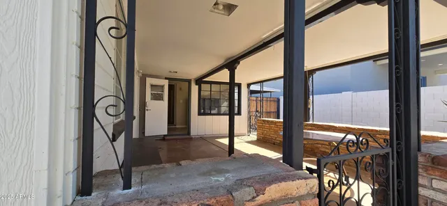a view of front door door and porch