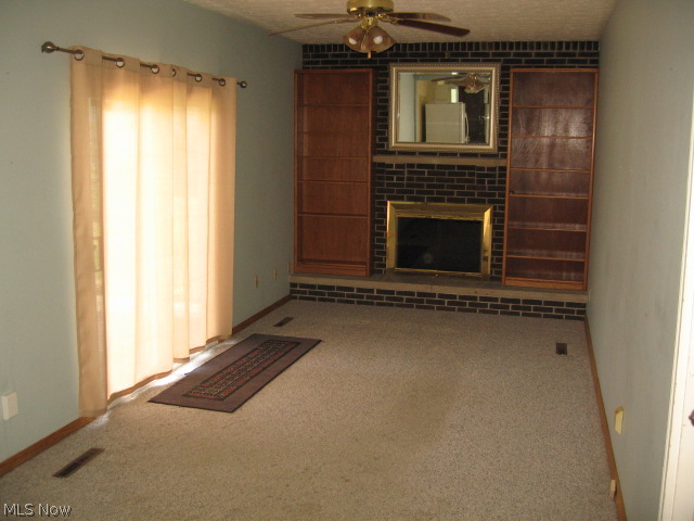 455 Broadview Road Tallmadge, OH 44278 - Photo 9 of 25 FAMILY ROOM - NEWER SLIDER LEADS TO PATIO AND BACK YARD