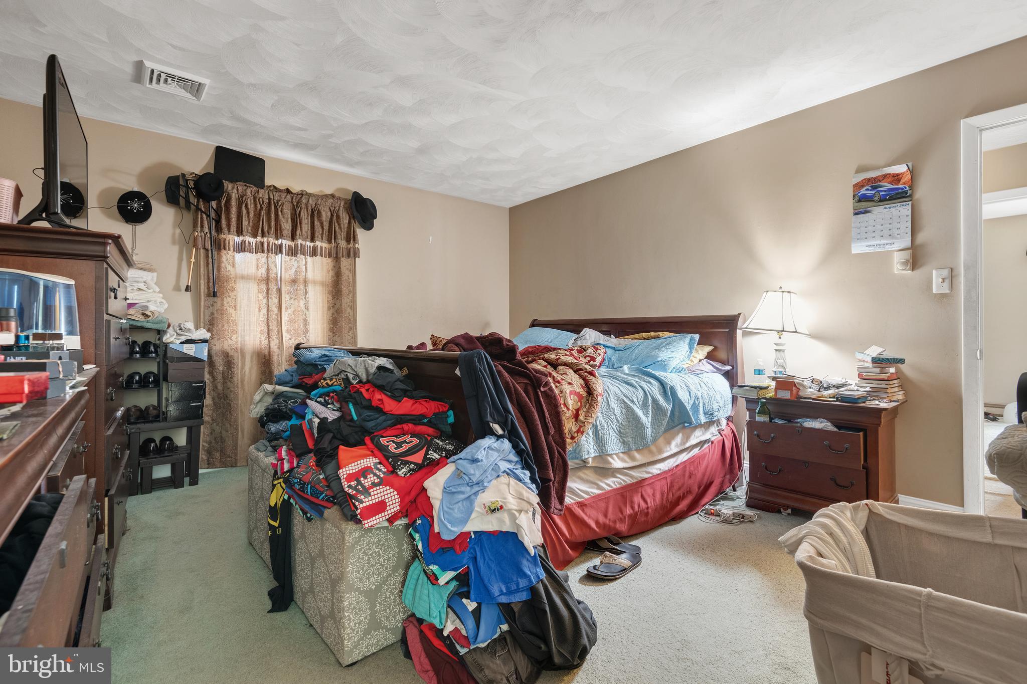 175 Scott Road York, PA 17403 - Photo 17 of 34 a bedroom with furniture and a flat screen tv