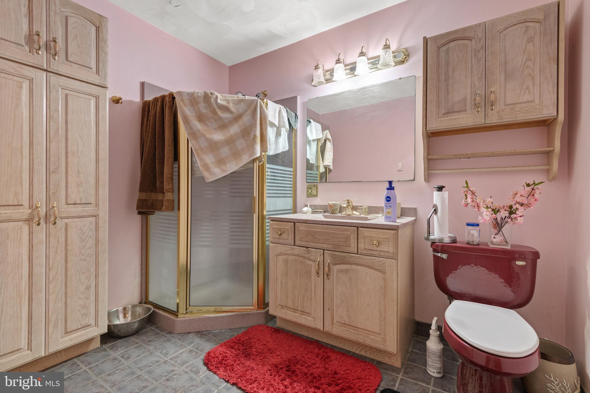 175 Scott Road York, PA 17403 - Photo 23 of 34 a bathroom with a granite countertop toilet sink and mirror