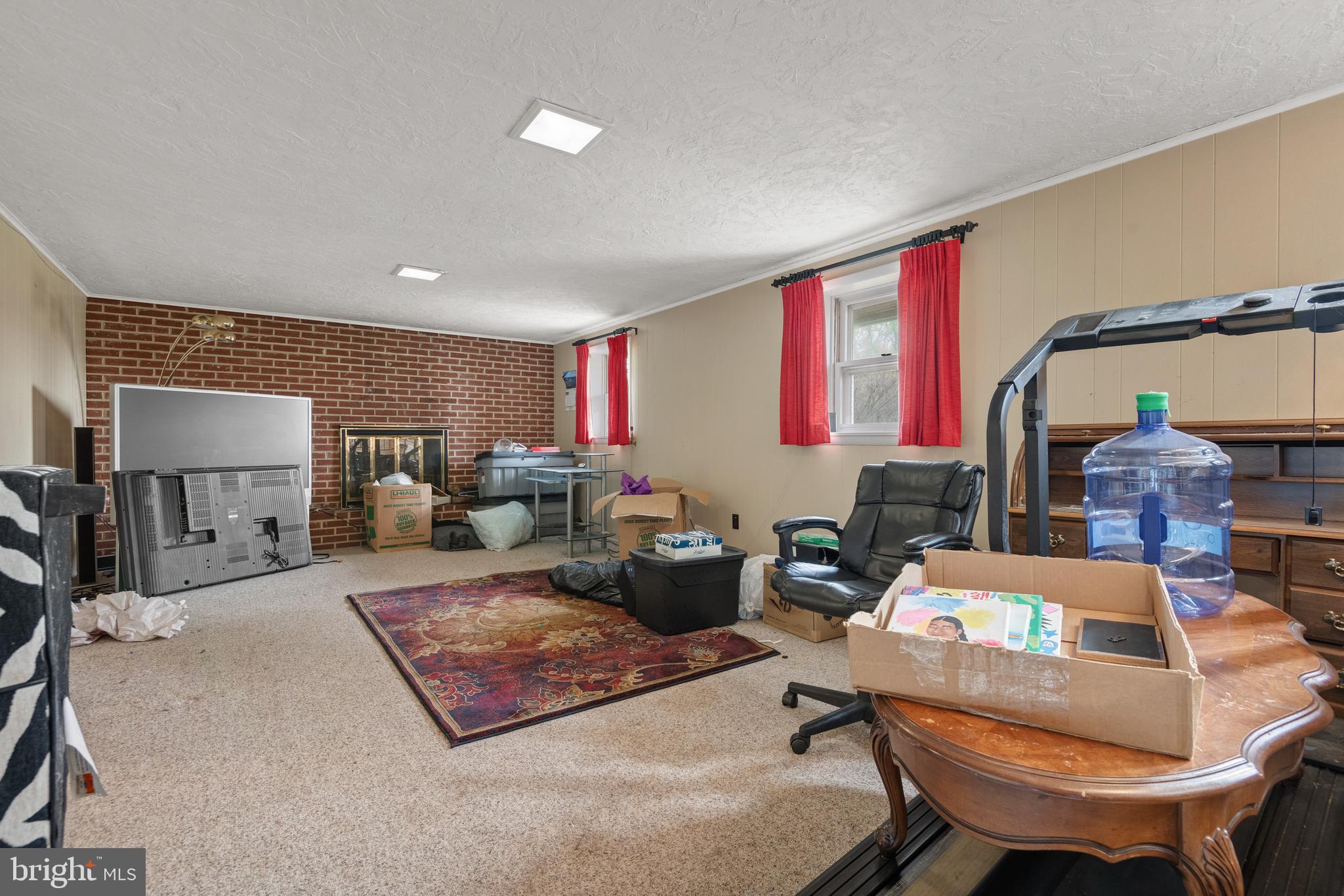 175 Scott Road York, PA 17403 - Photo 24 of 34 a living room with furniture a rug and a large window