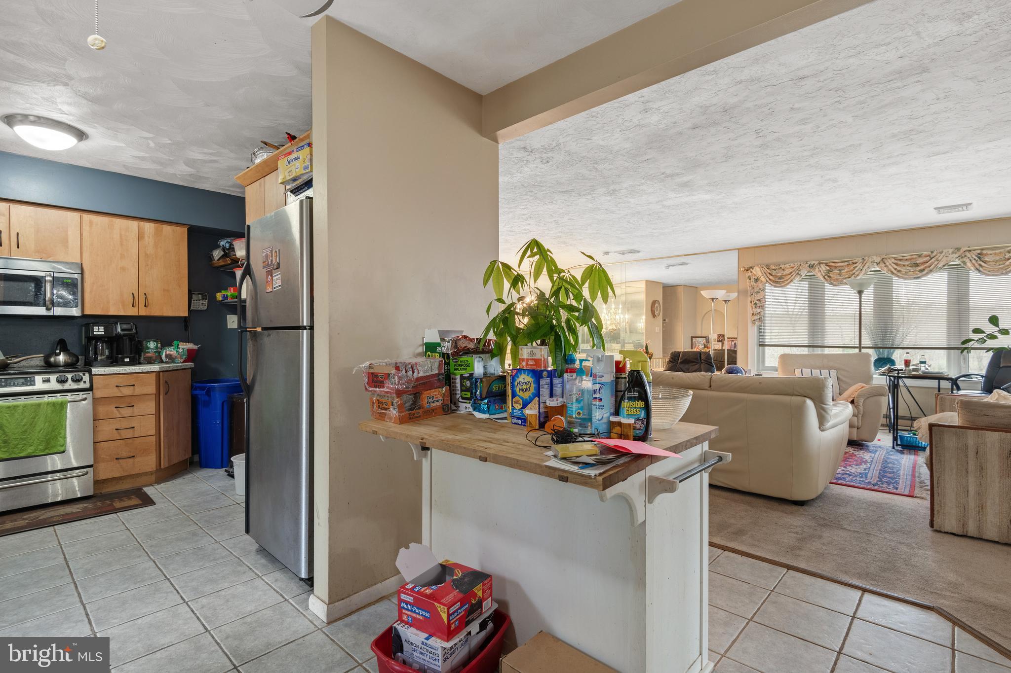 175 Scott Road York, PA 17403 - Photo 9 of 34 a kitchen filled with a white stove top oven and potted plant