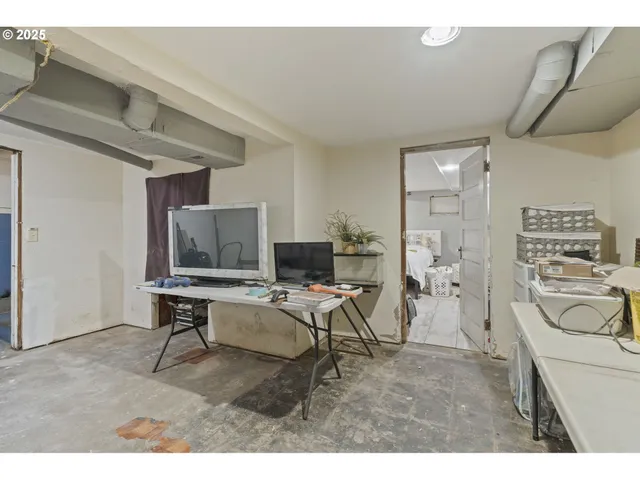 a view of a workspace with furniture