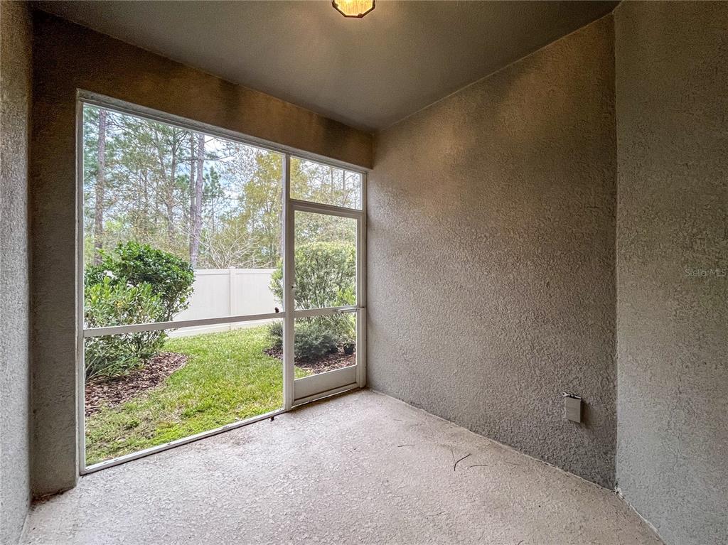 26391 Limestone Springs Way Wesley Chapel, FL 33544 - Photo 16 of 16 a view of a room with a large window