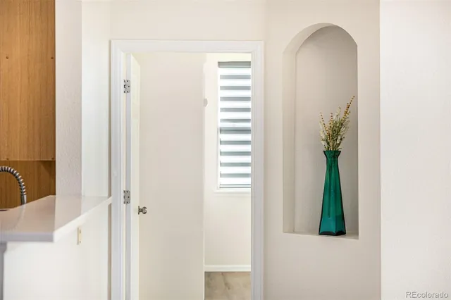 a view of a bedroom from a hallway