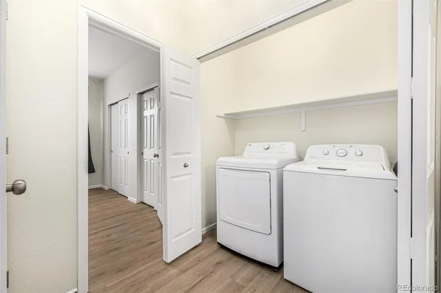 a view of storage room with washer and dryer